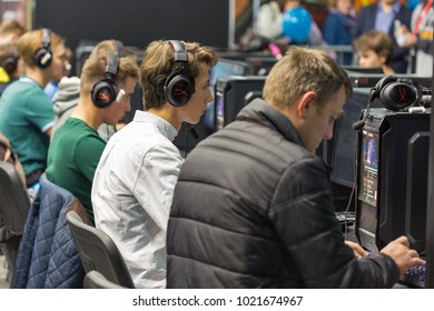 KIEV, UKRAINE - OCTOBER 08, 2017: Unrecognized people visit Wargaming company computer game zone during CEE 2017, the largest consumer electronics trade show of Ukraine in KyivExpoPlaza EC.
