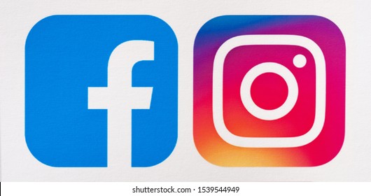Kiev, Ukraine - October 15, 2019: Popular social media logos Instagram and Facebook printed on paper. Logos for e-business, websites, mobile applications, banners.