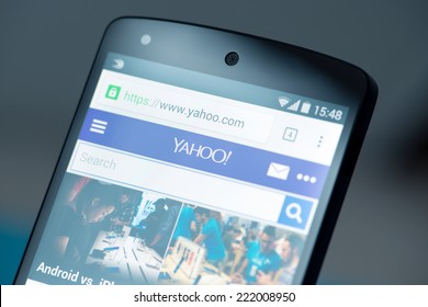 Kiev, Ukraine - September 12, 2014: Close-up Shot Of Brand New Google Nexus 5, Powered By Android 4.4 Version, With Yahoo Website News Page On A Screen.