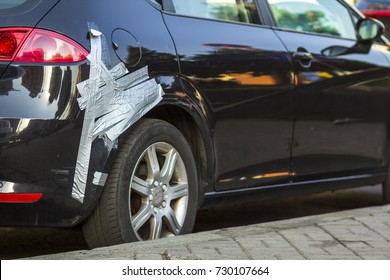 Kiev, Ukraine - September 20, 2017: Damaged Car With Duct Tape Repair