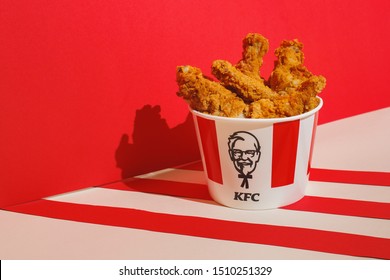 Kiev, Ukraine - September 21, 2019: KFC chicken on a red background