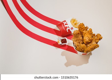 Kiev, Ukraine - September 21, 2019: KFC menu: fried chicken, nuggets, french fries and ketchup 