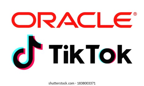Kiev, Ukraine - September 21, 2020: Oracle and TikTok logos, printed on paper. News about deal for Oracle and Walmart to acquire stakes in the US operations of video app TikTok
