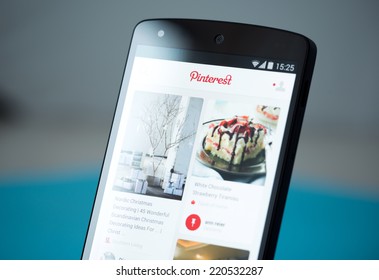 Kiev, Ukraine - September 22, 2014: Close-up Shot Of Brand New Google Nexus 5, Powered By Android 4.4 Version, With Pinterest Application Boards On A Screen. 