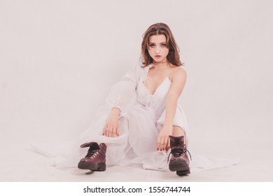 Kiev Ukraine-November 10, 2019
Young Female Model Posing On A White Cyclorama Background