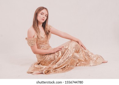 Kiev Ukraine-November 10, 2019
Young Female Model Posing On A White Cyclorama Background