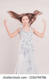 Kiev Ukraine-November 10, 2019
Young Female Model Posing On A White Cyclorama Background