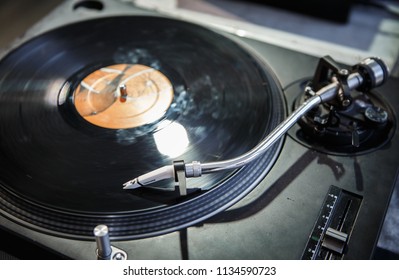 KIEV-30 JUNE,2018: Turntables Record Player Plays Music On Party In Night Club.Dj Turn Table Technics SL-1210 Playing Tracks.Concert Stage Audio Equipment Overhead View