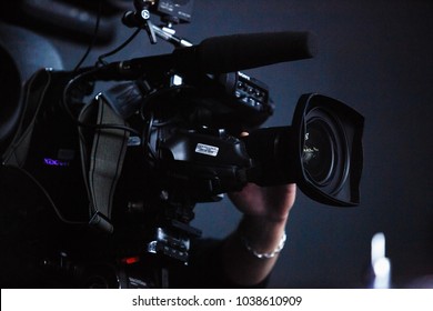 KIEV-9 FEBRUARY,2018:Professional Video Camera Man Broadcasting Concert On Stage.Cine 4k Video Cam Shoots Live Video Broadcast Footage For Television.TV Camera Operator Shoots Videos On Concert Stage