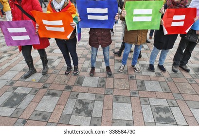 KIEV,UKRAINE - November 12, 2015: LGBT Activists Hold Posters Symbolizing Equality Of Rights,during A Rally To Stop The Discrimination By Sexual Orientation At Work,in Front Of The Parliament.
