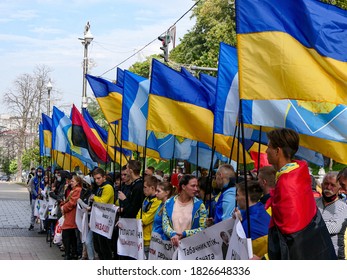 Kiev/Ukraine - September 29, 2020: Ukrainian National Blue Yellow Flags And Colorful Banners Above Heads Of Young People Students Of Olympic College At Street Protest Demonstration.Reportage Editorial