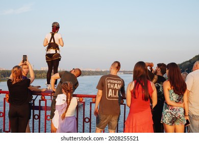 Kiev,Ukraine,02 August 2021: Woman Doing A Bungee Jump From The Bridge Under River Dnepr In Summer Time.
