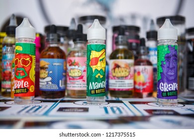 KIEV,UKRAINE-27 OCTOBER,2018: Plastic Bottles With E-liquids For Smoking Tobacco With Tasty Fresh Flavor.Buy New Bottle With Vape Juice,quit Smoking Nicotine.Plastic Containers With Flavored Glycerin