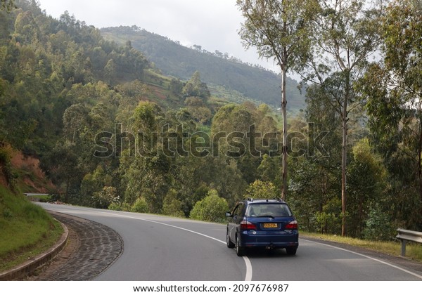KIGALI, RWANDA - Nov 11, 2018:\
Climbing a green mountain road on RN4, just North of Kigali,\
Rwanda