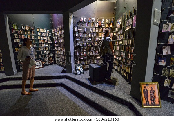 KIGALI, RWANDA - SEPTEMBER 2019: Tourists\
visiting the National Memorial to the victims of Genocide on\
September 25, 2019 in Kigali,\
Rwanda.
