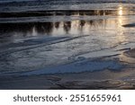 Kiiminkijoki river freezing over in Haukipudas, Oulu Finland