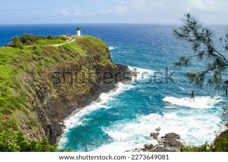 The Kilauea Lighthouse perched atop a steep cliff in Kauai, Hawaii.
