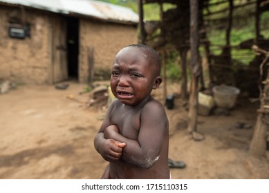 Kilembe, Uganda - October 22, 2016: Cute African Boy Crying With Tears Falling From His Face