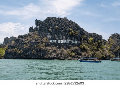 Kilim Geoforest park view with boats from Langkawi Island.