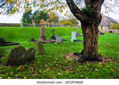 Kilkenny, Ireland. Cemetery In Front Of Cathedral Church Of St Canices In Kilkenny, Ireland During The Cloudy Day