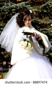Killer bride take aim with a big rifle