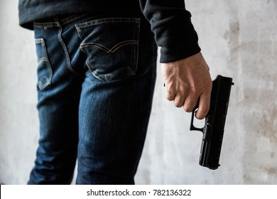 Killer Man Holding A Gun Side Him, Robbery, Murder, Crime