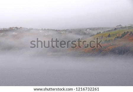 Killick Coast near Torbay,heavy fog over the ocean along the shoreline; Avalon Peninsula Newfoundland Canada 