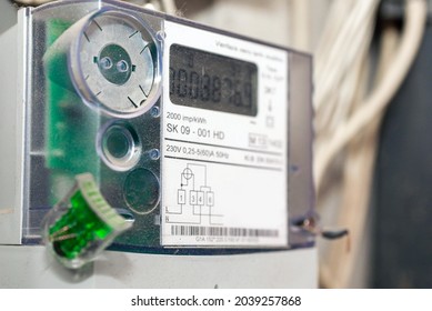 Kilowatt hour single stator power company meter.Watthour meter of electricity for use in home.This is a modern technology that can monitor the home's electrical energy consumption.Indoors shot.