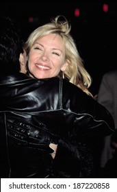 Kim Cattrall Getting Hugged By Mario Cantone At Premiere Of NORMAL, NY 3/12/2003