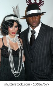 Kim Kardashian And Reggie Bush  At The Pur Jeans Halloween Bash. STK, Los Angeles, CA. 10-31-08