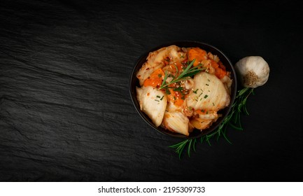 Kimchee In Black Bowl On Wooden Table. Spicy Kim Chi, Hot Fermented Napa Cabbage, Traditional Jimchi, Korean Winter Food Gimchi, Kimchee On White Background Top View