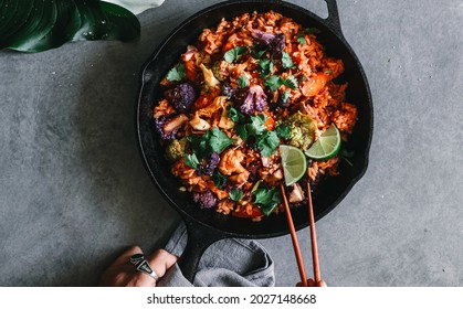 Kimchi Fried Rice with Cilantro, Sesame Seeds, Black Pepper, and Lime Juice