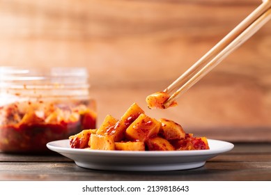 Kimchi Radish Eating By Chopsticks, Korean Homemade Side Dish Food