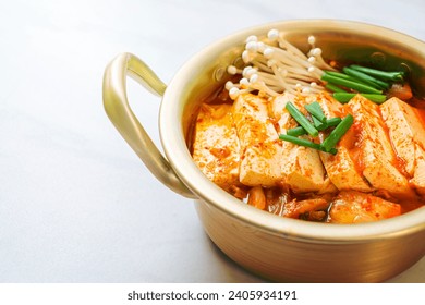 â€˜Kimchi Jjigaeâ€™ or Kimchi Soup with Soft Tofu or Korean Kimchi Stew - Korean Food Traditional Style