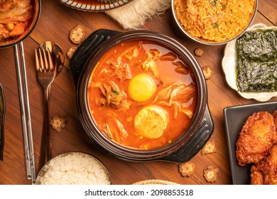 Kimchi stew or Kimchi soup, Korea’s national dish spicy soup with vegetable, meat, eggs, tofu served in a hot pot. Kimchi Jjigae korean trditional food. - Shutterstock ID 2098853518