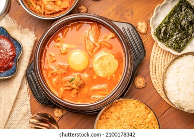 Kimchi stew or Kimchi soup, Korea’s national dish spicy soup with vegetable, meat, eggs, tofu served in a hot pot. Kimchi Jjigae korean trditional food. - Shutterstock ID 2100178342