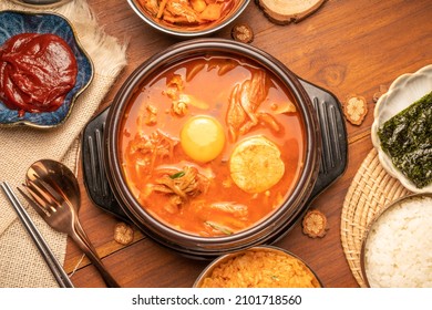 Kimchi stew or Kimchi soup, Korea’s national dish spicy soup with vegetable, meat, eggs, tofu served in a hot pot. Kimchi Jjigae korean trditional food. - Shutterstock ID 2101718560