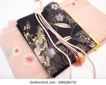A Kimono set for everyday wear in Japan (kimono, obi, obi holder, obi string), Sakura pattern: Made from polyester, not silk.