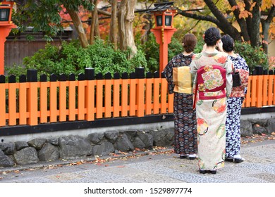 A Kimono Woman Traveling In Gion, Kyoto