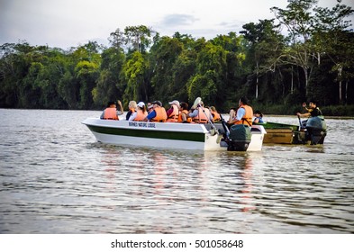 Kinabatangan, Malaysia - 09 May 2013 : Tourists On A Boat Cruise Along The River Of Kinabatangan, Some Of The Most Diverse Concentration Of Wildlife In Borneo.