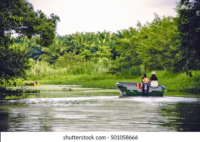 Kinabatangan, Malaysia - 09 May 2013 : Tourists On A Boat Cruise Along The River Of Kinabatangan, Some Of The Most Diverse Concentration Of Wildlife In Borneo.