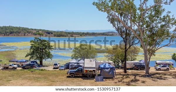 Kinchant\
Dam, Queensland, Australia - October 2019: Holidaymakers enjoying\
the last weeks of this camping ground before the local council\
closes it down for not conforming to\
regulations