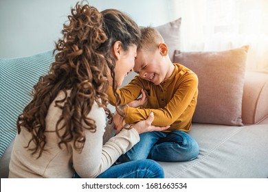 The Kind Of Love That Can't Be Described, Only Felt. Mother And Her Child, Tickling, Kidding And Having Fun In The Couch, With Spontaneous Smiles. Loving My Son 