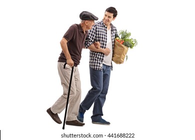 Kind young man helping a senior gentleman with his groceries isolated on white background - Shutterstock ID 441688222