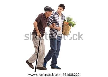 Kind young man helping a senior gentleman with his groceries isolated on white background