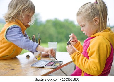 Kindergarten children painting in wood kindergarten - Powered by Shutterstock