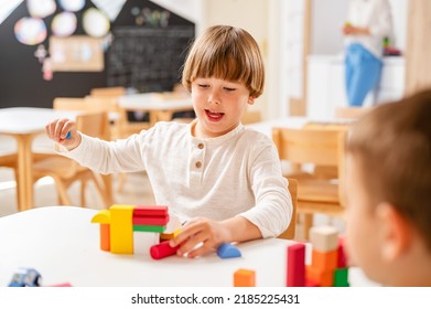 Kindergarten Children Playing With Colorful Building Blocks. Healthy Learning Environment. Learning Through Play.