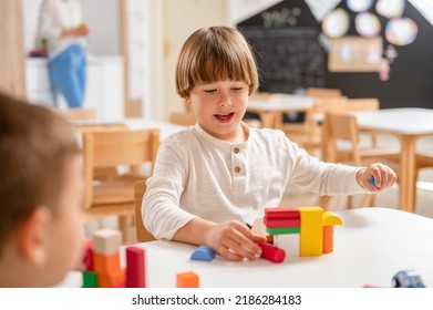 Kindergarten Children Playing With Colorful Building Blocks. Healthy Learning Environment. Learning Through Play.