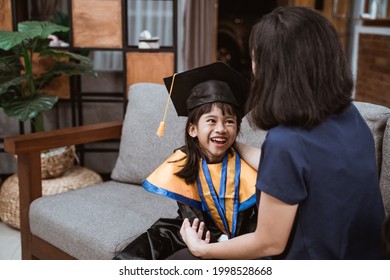 Kindergarten Graduation. Asian Family And Parent On Her Kid Kinder Graduate Day.