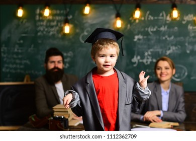 Kindergarten Graduation Day. Family Of Mother, Father And Son On Kinder Graduate Day